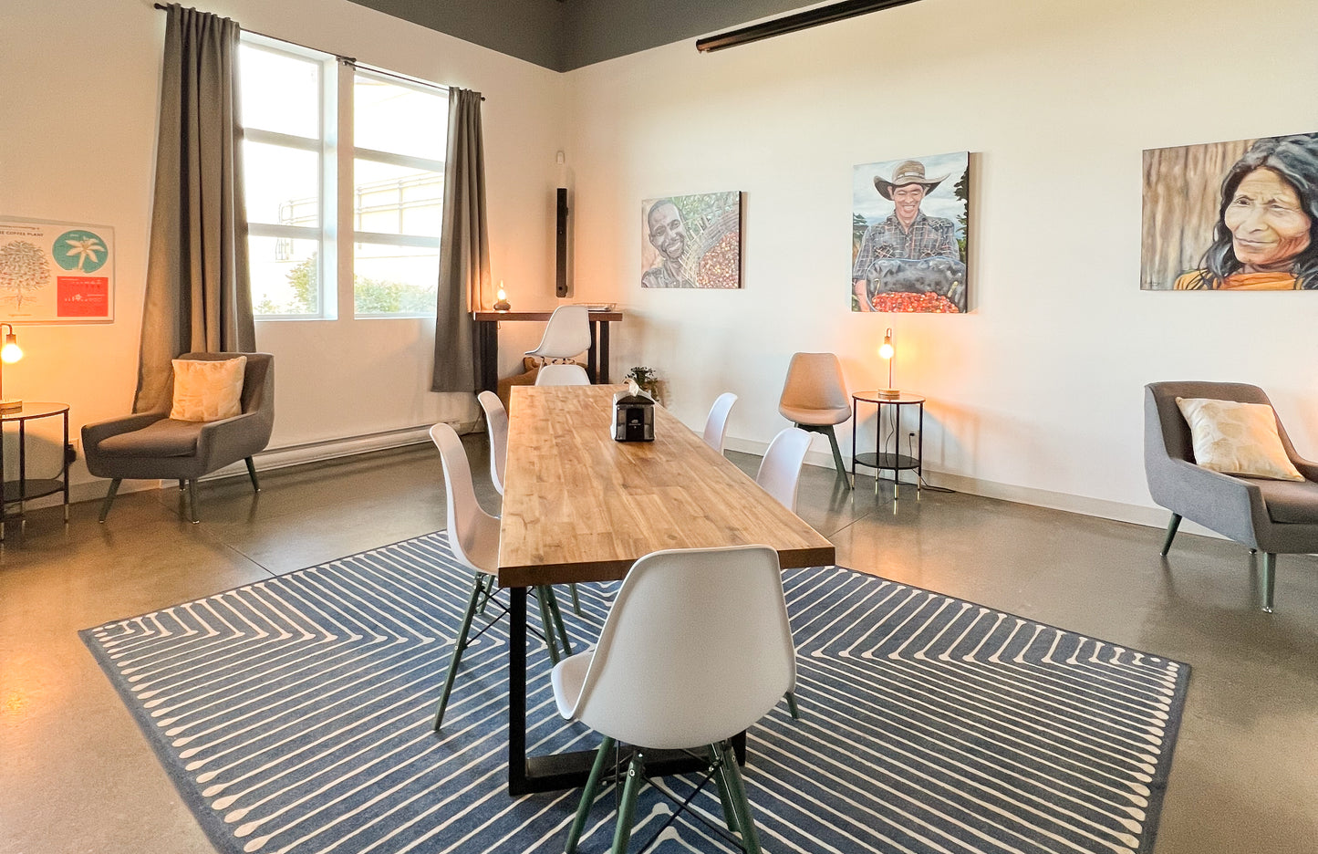 The back room of our tasting room, warmly filled with light and is cozy for those wanting to enjoy their coffee. 